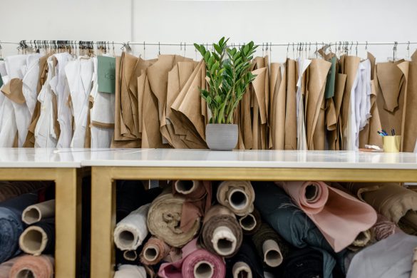 clothing store with rolls of fabric