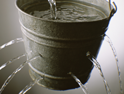 Bucket of water with holes