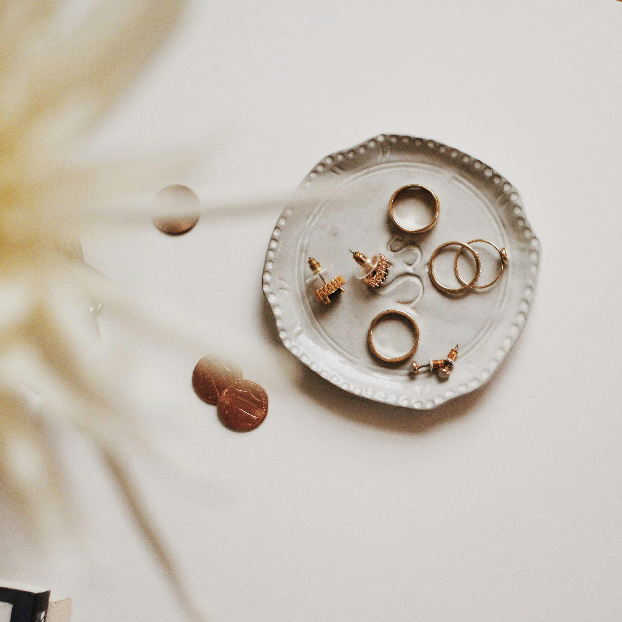 Tray of Jewelry and pennies